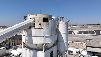 Aerial drone view of industrial cement plant and construction materials factory