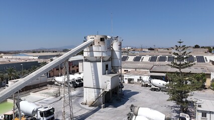 Aerial drone view of industrial cement plant and construction materials factory