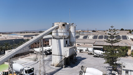 Aerial drone view of industrial cement plant and construction materials factory