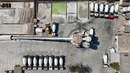 Aerial drone view of industrial cement plant and construction materials factory