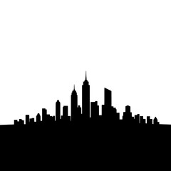 Obraz premium City Skyline Silhouette Featuring Tall Buildings at Sunrise