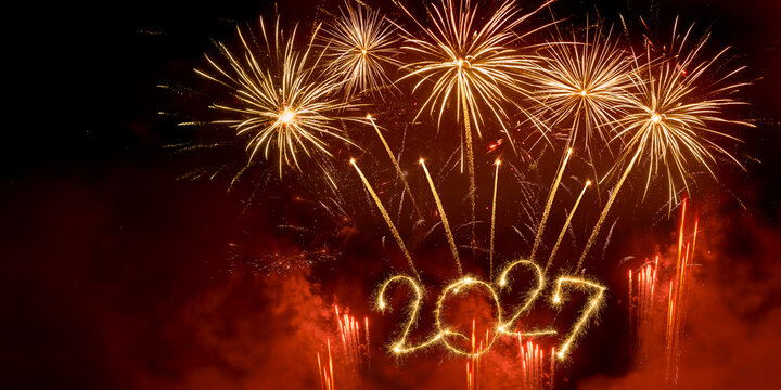 happy new year, new year's eve, silvester, new year, celebration greeting card, new year card - Year 2027 in sparkler font and firework fireworks pyrotechnic, isolated on black night sky background