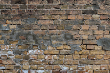 brown background, in the photo an old brick wall