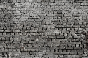 gray background, in the photo the texture of an old brick wall