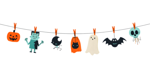 Cute halloween decorations hanging on a clothesline against black background