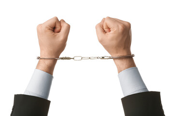 Businessman hands in handcuffs isolated on white background