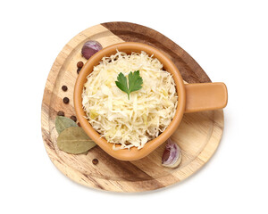 Bowl with tasty sauerkraut and different spices on white background