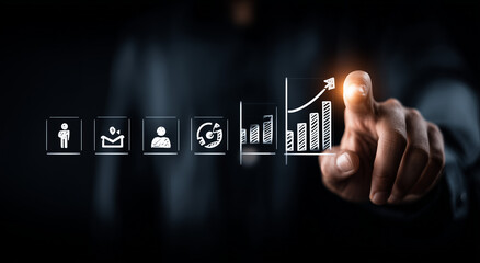 Businessman interacting with a futuristic virtual display showing financial growth and data analytics