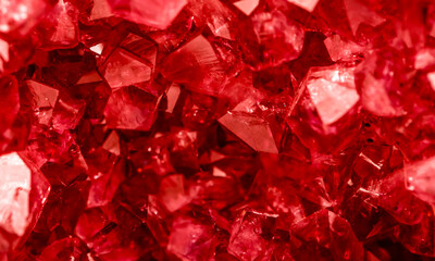 Amethyst red crystals. Gems. Mineral crystals in the natural environment. Texture of precious and semiprecious stones. Seamless background with copy space colored shiny surface of precious stones. © Vera