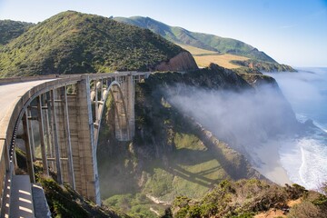 Beautiful view of the Bixby Bridge from Vista Point. A lovely road trip from Los Angeles to San Francisco along the West Coast by the Pacific Ocean. Beautiful scenery in California. High quality photo