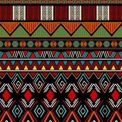 Arabian ethnic tribal fabric pattern in a bold geometric style, featuring green, orange, and red tones that contrast ethnic beautifully with a crisp white background. Inspired by ancient Arabian ethni