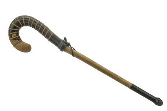 A rustic, curved shillelagh club, featuring a dark wrapped handle, a wooden shaft, and a dark capped end. Traditional Irish walking stick. background removed