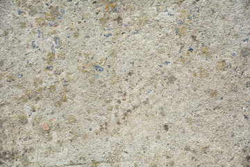 Coarse concrete wall texture with visible aggregate and rough construction surface