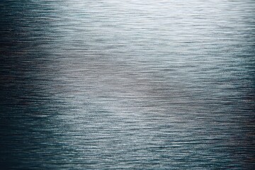 Abstract Water Surface Reflecting Sunlight Creating Lines and Texture with Blue and White Tones