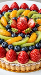 Obraz premium Vibrant Mixed Fruit Tart with Fresh Strawberries, Blueberries, and Kiwi