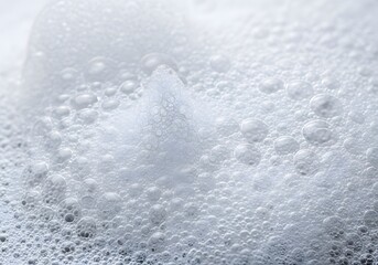 Obraz premium Closeup of Foamy Suds White Soap Bubbles Texture, Cleaning, Hygiene, Foam Bath Background