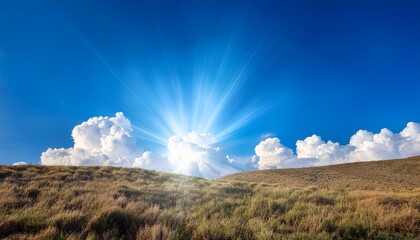 bright sun rays beaming through fluffy clouds in a clear blue sky creating a picturesque scene with copy space image