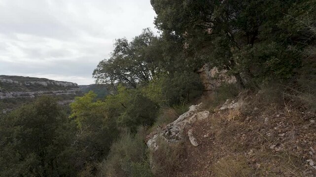 First person view hiking on mountain trail in orgon, france