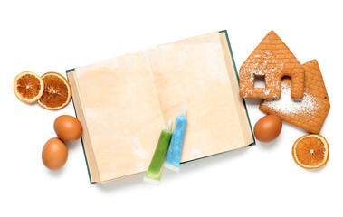 Blank recipe book with Christmas cookies, eggs and dried citruses on white background