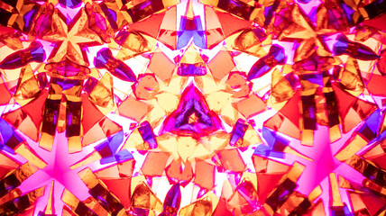 Natural macro kaleidoscope pattern photographed with a camera, showing vibrant abstract geometric...