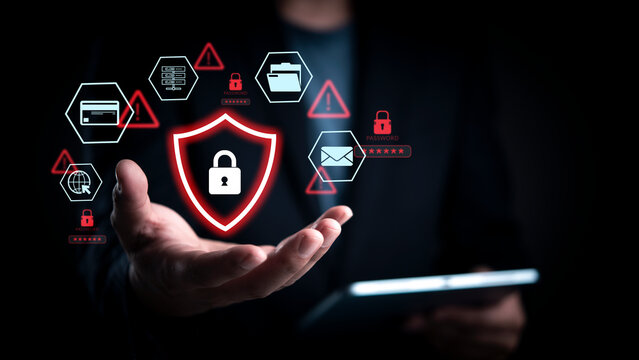 Cybersecurity threat alert concept. Man hand show red shield padlock icon. Data protection network security. Hacker attack warning. Virtual interface internet finance password credit card protection. - Powered by Adobe