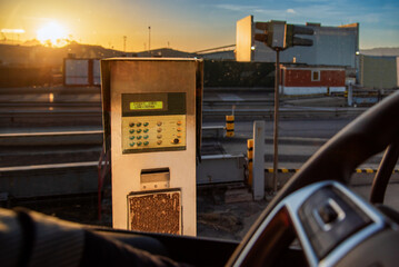 View from truck cabin showing industrial weighing scale during load measurement