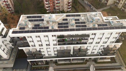 Fototapeta premium Aerial view residential building with solar panels