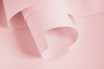 Long sheets of paper from a roll of pink tone.