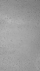 Raindrops on glass close-up. Selective focus