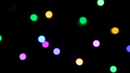 colorful bokeh lights on black background,abstract background of colorful bokeh lights,light leak overlay effect with rainbown bokeh ,Christmas xmas bokeh backgrou,glitter bokeh sparkles lights