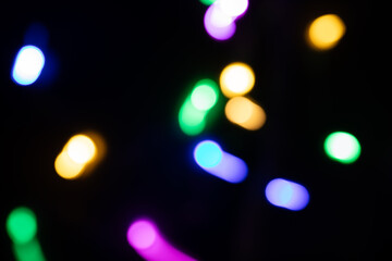 colorful bokeh lights on black background,abstract background of colorful bokeh lights,light leak overlay effect with rainbown bokeh ,Christmas xmas bokeh backgrou,glitter bokeh sparkles lights
