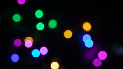 colorful bokeh lights on black background,abstract background of colorful bokeh lights,light leak overlay effect with rainbown bokeh ,Christmas xmas bokeh backgrou,glitter bokeh sparkles lights