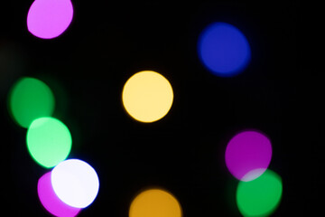 colorful bokeh lights on black background,abstract background of colorful bokeh lights,light leak overlay effect with rainbown bokeh ,Christmas xmas bokeh backgrou,glitter bokeh sparkles lights