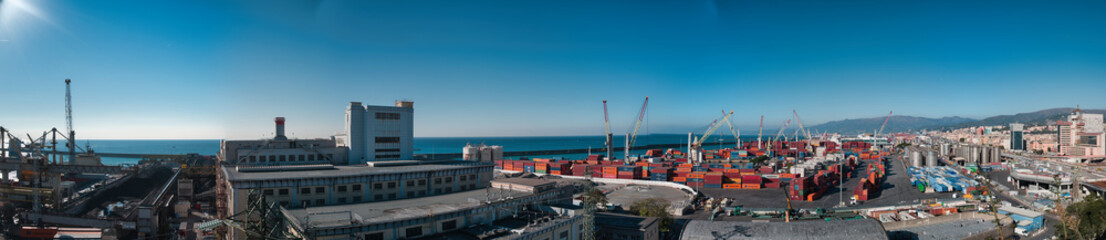gosses panorama of the harbor in Genoa in Italy with blue sky