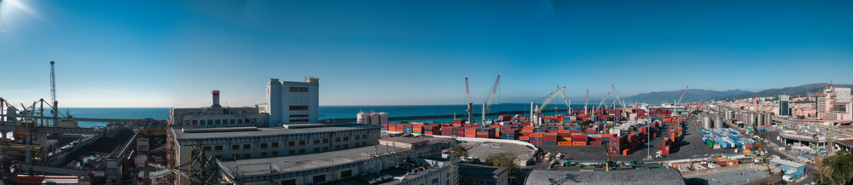 gosses panorama of the harbor in Genoa in Italy with blue sky