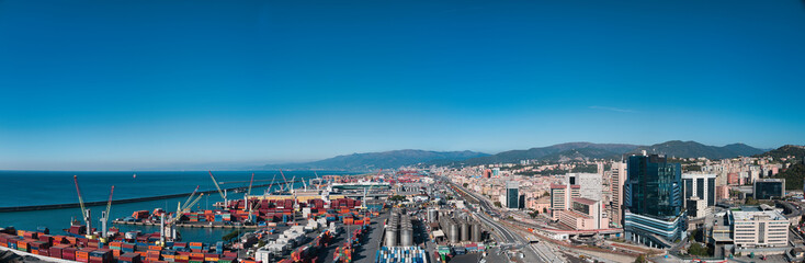 gosses panorama of the harbor in Genoa in Italy with blue sky