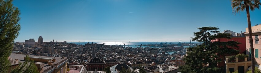 large panorama of Genoa in Italy with blue sky