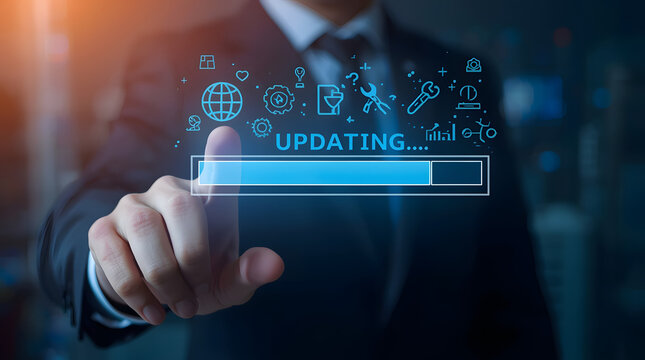 Man in a suit interacting with a digital interface showing updating and a progress bar