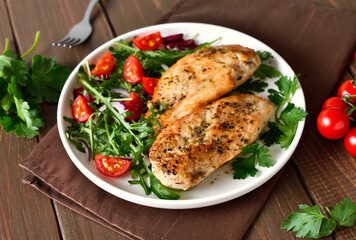 Oven baked chicken breast and vegetable salad