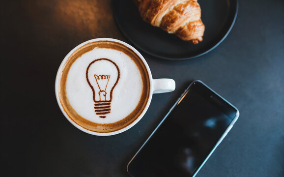 Creative Morning Idea Concept with Lightbulb Latte Art Coffee