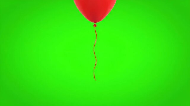 Animated red balloons floating against a bright green background for celebratory scenes