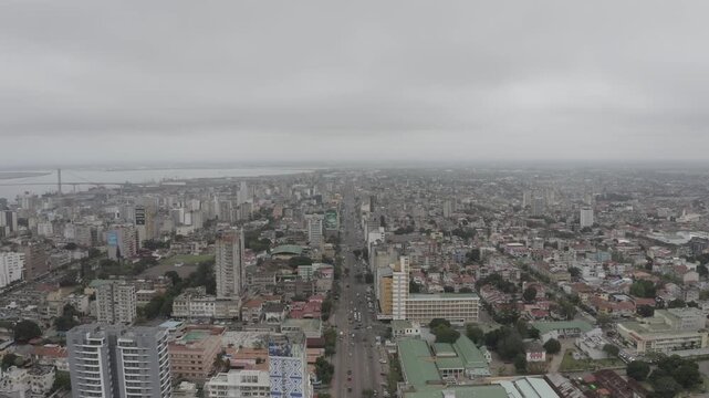 Aerial drone view of Eduardo Mondlane Avenue in Maputo City, Mozambique, showcasing urban architecture, busy streets, and the vibrant cityscape of the Mozambican capital.