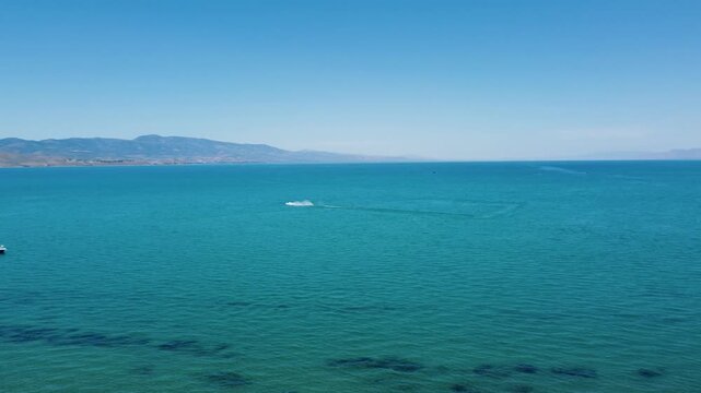 4K Aerial Summer Views of Bear Lake State Park Utah - Paddle Boarding and Boating activities