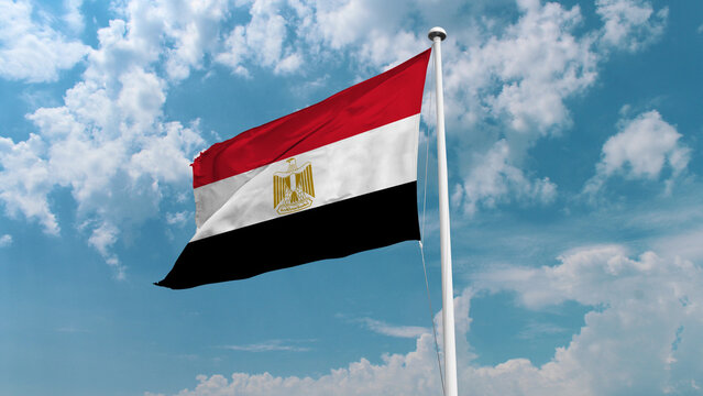 Egyptian national flag waving against a clear blue sky, representing unity, pride, and heritage with its red, white, and black stripes and the golden eagle of Saladin.