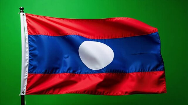 Laos flag waving proudly in the breeze, a symbol of national pride and heritage set against a vibrant green backdrop in stunning 4K video footage