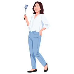 young wife woman in a white shirt and light blue jeans stands holding a metal spatula, ready to cook