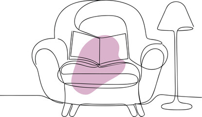 Cozy armchair with book and lamp reading interior