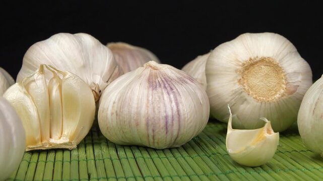 Garlic - very healthy product with many beneficial properties for health. Allium sativum, species of bulbous flowering plants in genus Allium