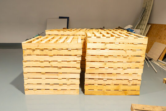 neatly stacked pair of wooden pallet columns