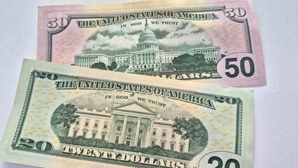 American or US dollars in form of a bunch of fifty and twenty dollar bills - money in the USA